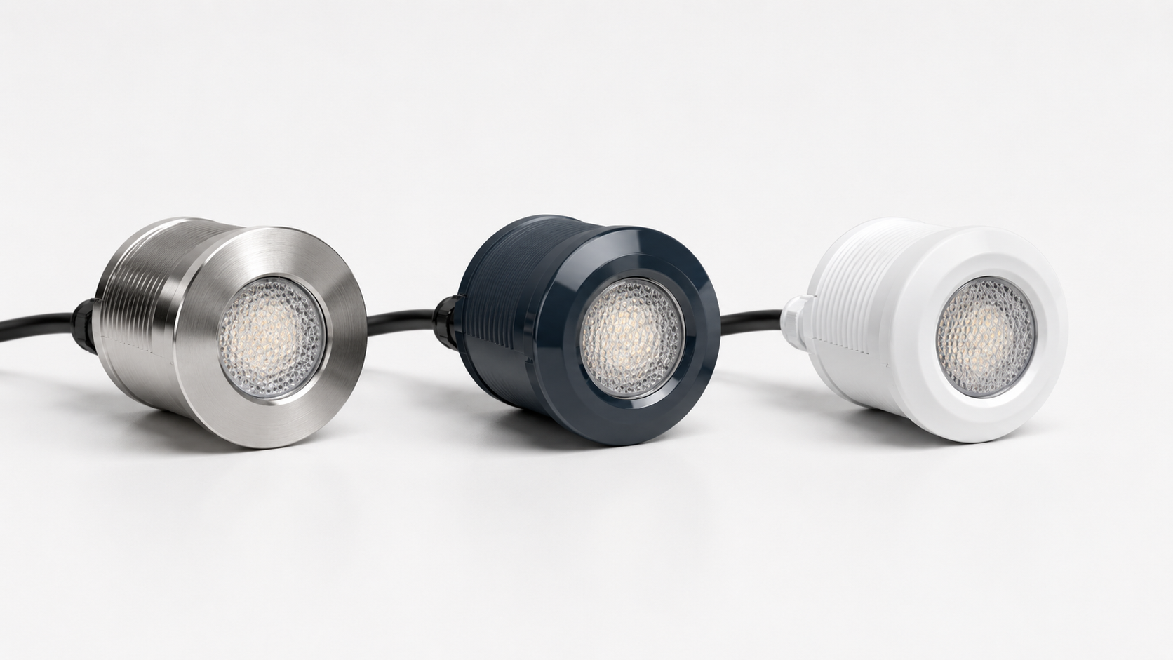 Pentair, Hayward, and Jandy LED pool lights side by side, illustrating the three brands that dominate the residential pool light market